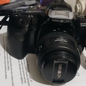 Black MINOLTA 300SI W/NOVA 1 LOWEPRO Case...MUST GO!!!  ALL OFFERS WELCOME!!!